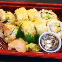 Crunchy Roll · Cut roll. Shrimp Tempura, imitation crab, Japanese cucumber, with crunchy tempura flakes and...