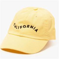 California Cap In Yellow · This cap was inspired by the Golden State, evoking its majesty filled with wild poppies, shi...