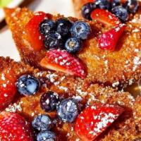 House French Toast · Deep-fried toast, mixed berries, maple syrup, condensed milk.