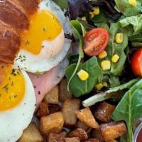 Croissant Smoked Salmon Sandwich · Smoked salmon, sunny side up egg, tomato, spinach, sour cream, toasted croissant.