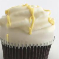 Lemon Filled Cupcake · Vanilla cake with lemon filling, swirled with a lemon mousse and dipped in a white chocolate...