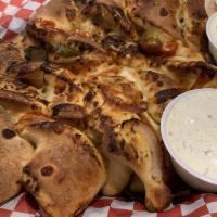 Spicy Garlic Twist · Jalapeños, onions, hot sauce and cheese topped with Mozzarella and served with spicy ranch d...