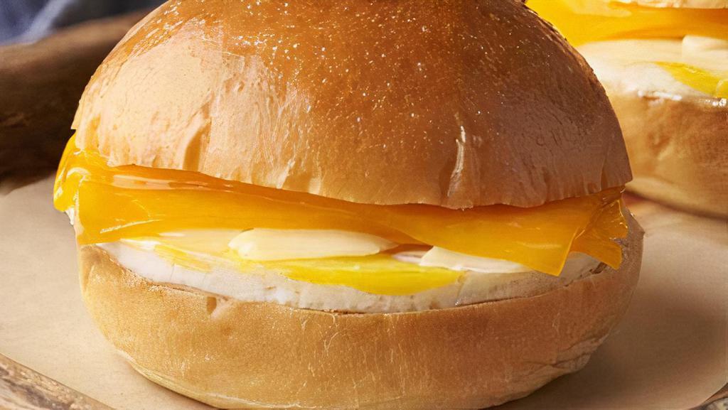 Egg & Cheese Brioche · Brioche bun, Egg, Shaved Parmesan, Cheddar. Contains: Egg, Milk, Soy, Wheat