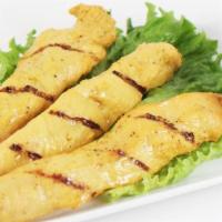 Chicken Satay · Three chicken strips on skewers, grilled & served with peanut sauce.