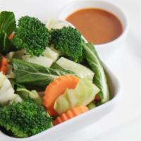 Steamed Veggies · Steamed mushrooms, cabbage, broccoli, carrots served with peanut sauce.