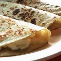 Quesadillas · steak, onions, cilantro, mild, hot sauce, topped with cheese.