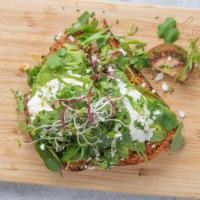 Real Avocado Toast · Real avocado toast, house made red pepper pesto, feta cheese, Asian greens, olive oil.
 Even...