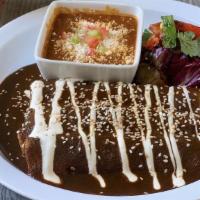 Enchiladas De Mole · our house mole sauce, (choice of chicken OR cheese cannot have a combination of both)
served...