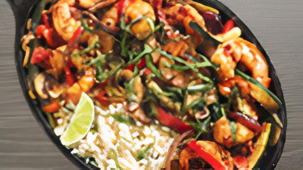 Thai Shrimp Skillet · Spicy Beef & Chicken . Sautéed shrimp, fresh vegetables, oven-roasted tomatoes and mushrooms in a spicy Thai shrimp sauce. Served with herb rice and topped with basil.