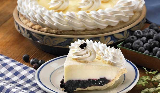 Double Cream Blueberry Slice · Creamy vanilla custard and sour cream top a bed of savory blueberries, enhanced with flavorful apples.