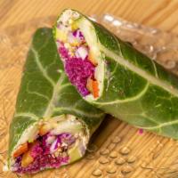 Farmer'S Market Wrap · Collard green leaf smothered in hummus or nut and seed cheese, filled with cucumbers, tomato...