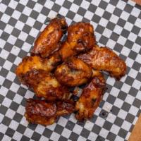 Chicken Wings 10 Pieces · Savory wings with choice of one dipping sauce.