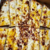Bacon Cheddar Bread · Fresh dough topped with garlic Alfredo sauce, Cheddar cheese, bacon bits and a sprinkle of s...