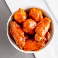 Buffalo Wings · Choice of hot and spicy or BBQ. Served with ranch.