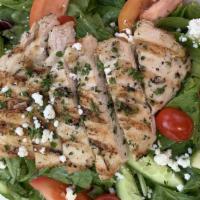 Grilled Chicken Breast Salad · grilled chicken, organic mixed greens, Roma tomato, cucumber, red onion & topped with feta c...
