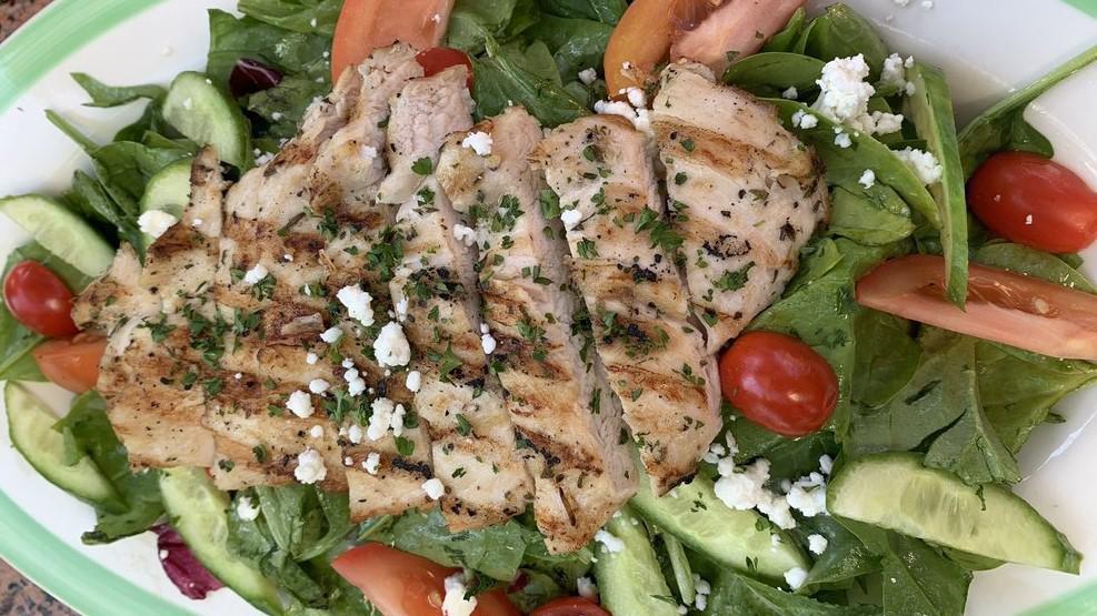Grilled Chicken Breast Salad · grilled chicken, organic mixed greens, Roma tomato, cucumber, red onion & topped with feta cheese.