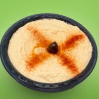 Hummus · Garbanzo beans with tahini, garlic, olive oil and lemon juice.