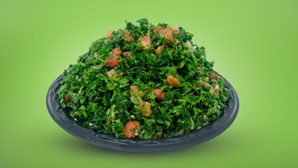 Tabouleh · Chopped parsley, green onion, cracked wheat, diced tomato tossed with olive oil and lemon juice.