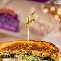 Turkey Melt · Turkey and melted cheese with your choice of toppings on bread.