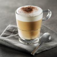 Espresso Macchiato · Rich, dark espresso shots with frothed milk.