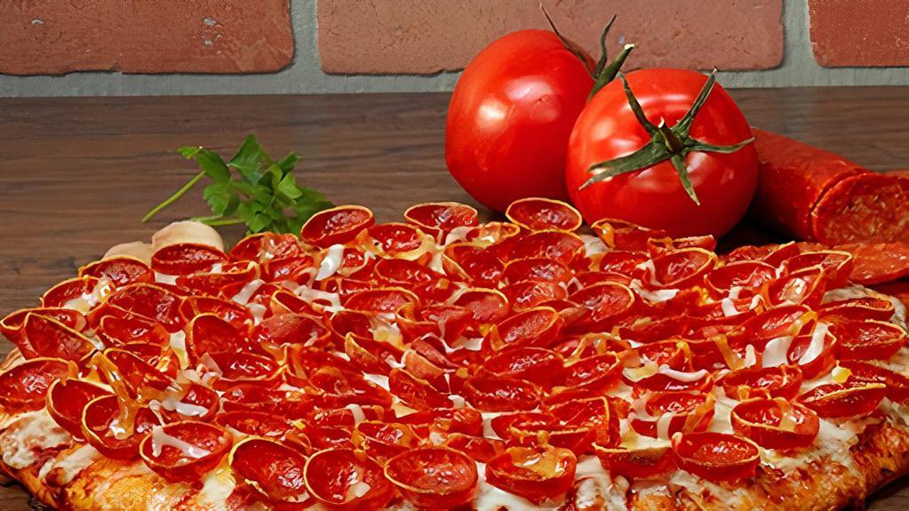 Pepperoni · Lots of crispy, curly pepperoni on our red sauce.