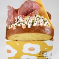 Ham N Cheese Sandwich · Ham n Cheese Sandwich made with our signature creamy cage-free scramble with, well-done smok...