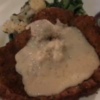 Chicken Fried Steak & Eggs · Tender beef, lightly floured and fried golden brown, then covered with country gravy and ser...