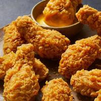 Golden Original Wings
 · Deliciously juicy inside and perfectly crunchy outside. Our original fried chicken is known ...
