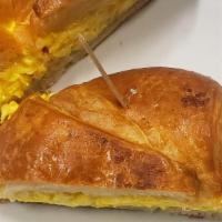 Breakfast Croissant Sandwich · Scrambled eggs with Jack cheese on Plain Croissant.