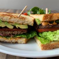 Vegan Sausage Sandwich · Home made Vegan Sausage, Vegan Chipotle Mayo, Tomatoes, avocado, romaine 
Mix green salad on...