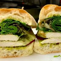 Chicken Pesto Sandwich · Grilled chicken breast, tomatoes, pesto and mix greens 
Mix green Salad on the side with Ita...