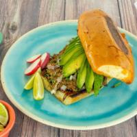 Torta De Birria · Toasted torta bread, melted cheese, our shredded beef birria, and avocado. Optional to add o...