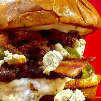 The Big Blue Q · BBQ sauce, bacon, bleu cheese, bleu cheese crumbles, pickles, fried onion strings...