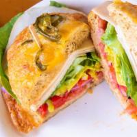 Crazy Turkey · Turkey, Pepper Jack Cheese, Avocado, Lettuce, Red Onion, Roasted Peppers, Pepperoncini, Chip...