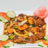 Tôm Ram Mặn Or Tôm Sườn Ram · Shrimps or shrimps & pork riblets caramelized in fish sauce.