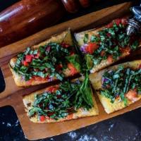 Bruschetta (4 Pcs) · Freshly sliced garlic bread with extra-virgin olive oil, fresh tomatoes, onions and fresh ba...