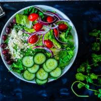 Greek Salad · Romaine lettuce, red onion, tomato's, cucumber, Kalamata olives, and feta cheese, Italian dr...