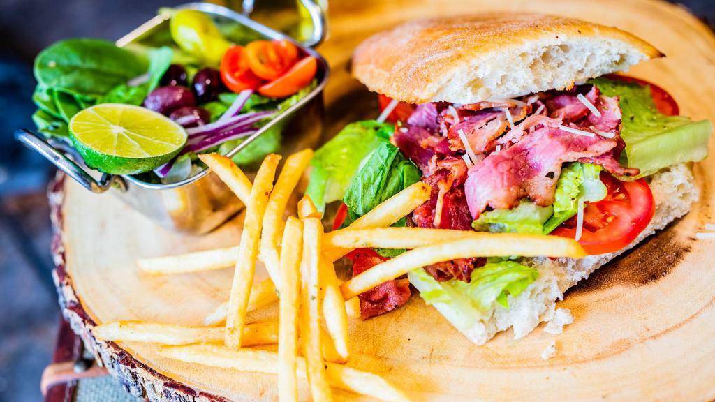Beef Pastrami Sandwich · The right choice for pastrami lovers. Beef pastrami, mozzarella cheese, lettuce, tomatoes, mustard and mayo. Served on choice of bread with choice of side.