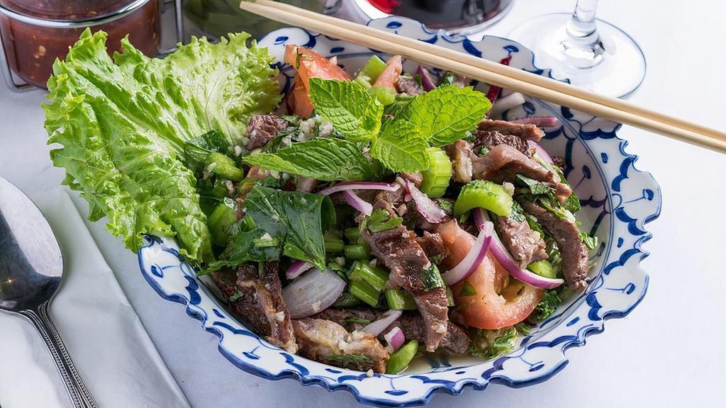 Beef Salad · Grilled 8 oz. ribeye steak, cucumber, tomatoes, onions, cilantro, celery, mints, lime juice and fish sauce