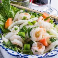 Seafood Medley Salad · Combination of prawns, calamari,. layered in with fresh cucumber, onions,. tomatoes, celery,...