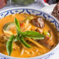 Red Curry (L) · Eggplant, bamboo shoots, bell peppers and sweet basil leaves. Simmered in red curry and coco...