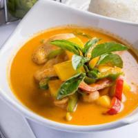 Pineapple Curry (L) · Fresh pineapple, bell peppers, tomatoes and sweet basil. Simmered with red curry and coconut...