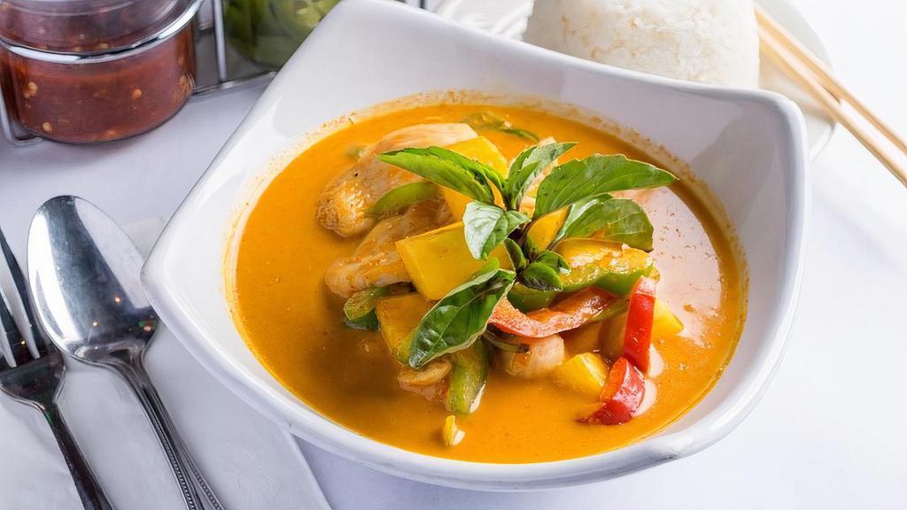 Pineapple Curry (L) · Fresh pineapple, bell peppers, tomatoes and sweet basil. Simmered with red curry and coconut milk