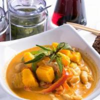 Pumpkin Curry (L) · Pumpkin, carrots, bell peppers and sweet basil. Simmered in red curry and coconut milk