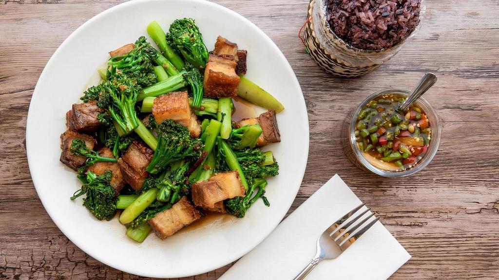 Crispy Pork Belly (L) · Our crispy pork belly is homemade here at. MTK daily. Comes with crunchy broccolini. in house sauce. Your choice of rice