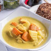 Yellow Curry · Potatoes, onions and carrots simmered in. mild yellow curry and coconut milk