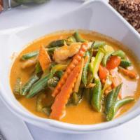 Panang Curry · Green beans, bell peppers, carrots, kaffir lime leaves. Simmered in creamy panang curry with...