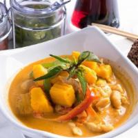 Pumpkin Curry · Pumpkin, carrots, bell peppers and sweet basil. Simmered in red curry and coconut milk