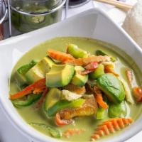 Avocado Curry · Avocado, bell peppers, carrots and snow peas. Simmered in creamy green curry and coconut milk