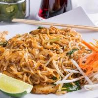 Pad Thai · Wok stir-fried Thai rice noodles with egg, tofu, bean sprouts, green onions and topped with ...